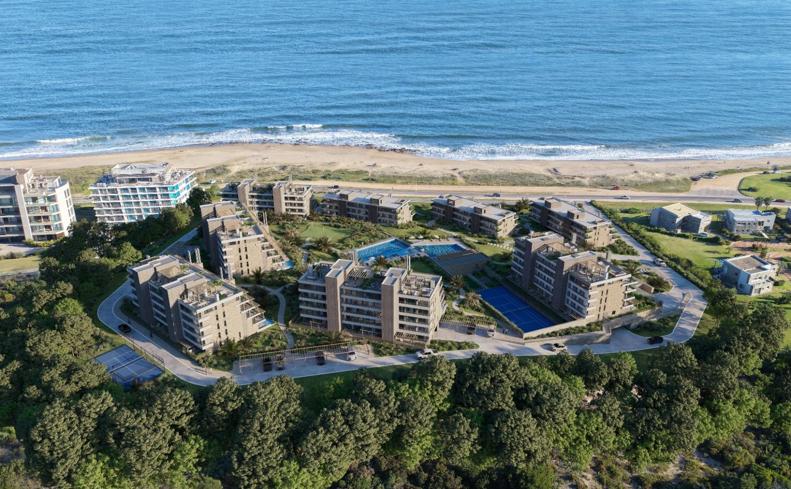 Selenza Residences — Vista aérea del complejo con piscinas y canchas