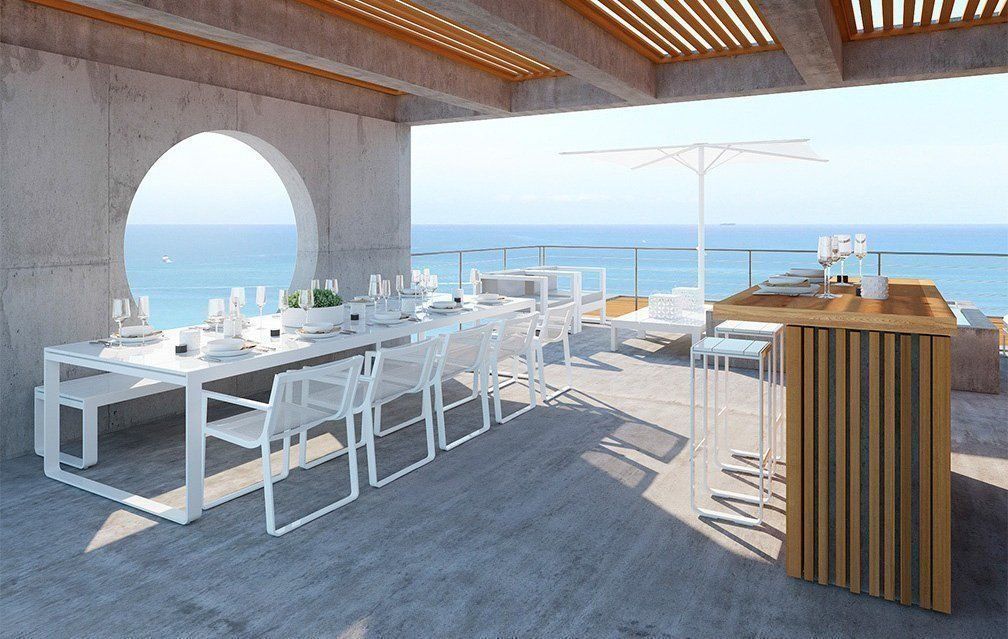 Render del rooftop con la mesa tendida y el mar de fondo