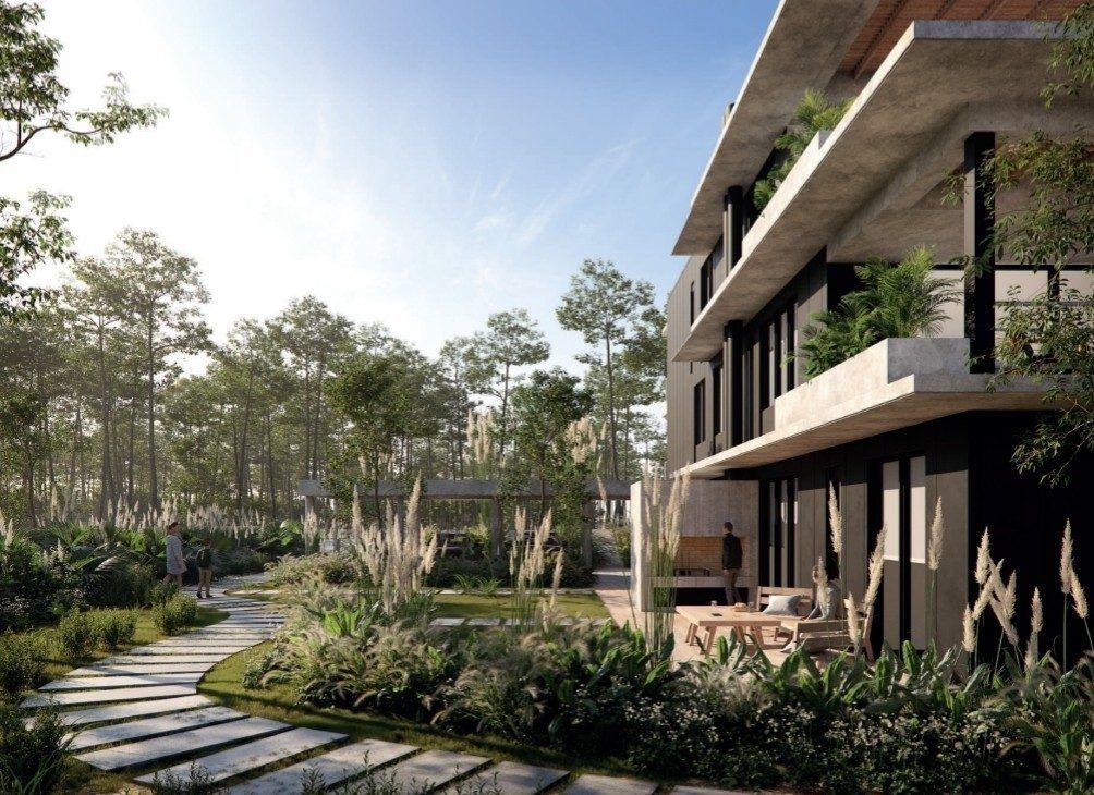 Render del sendero de lajas entre pastizales, con las terrazas verdes del edificio