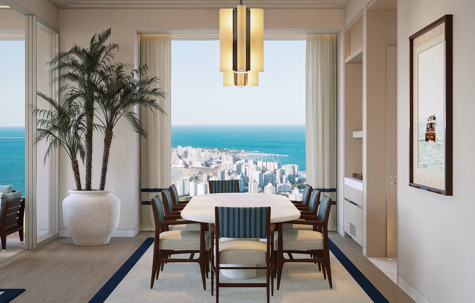Comedor con la península y el puerto de Punta del Este de fondo