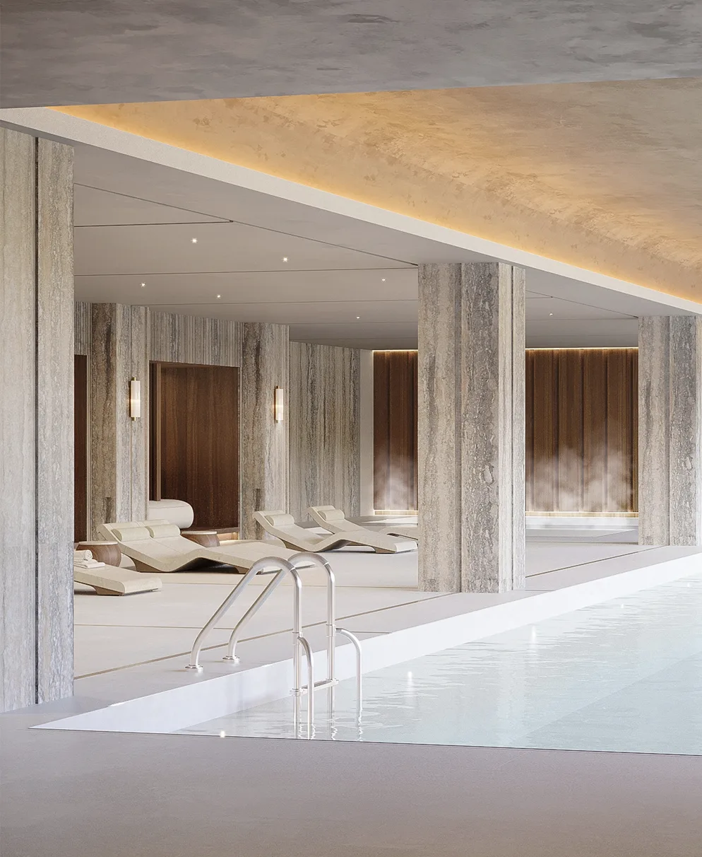 Spa de Cipriani con piscina cubierta entre columnas de travertino