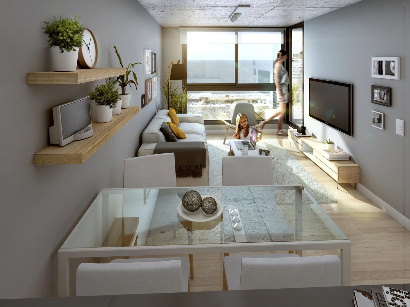 Living comedor de una unidad, con la costanera por la ventana