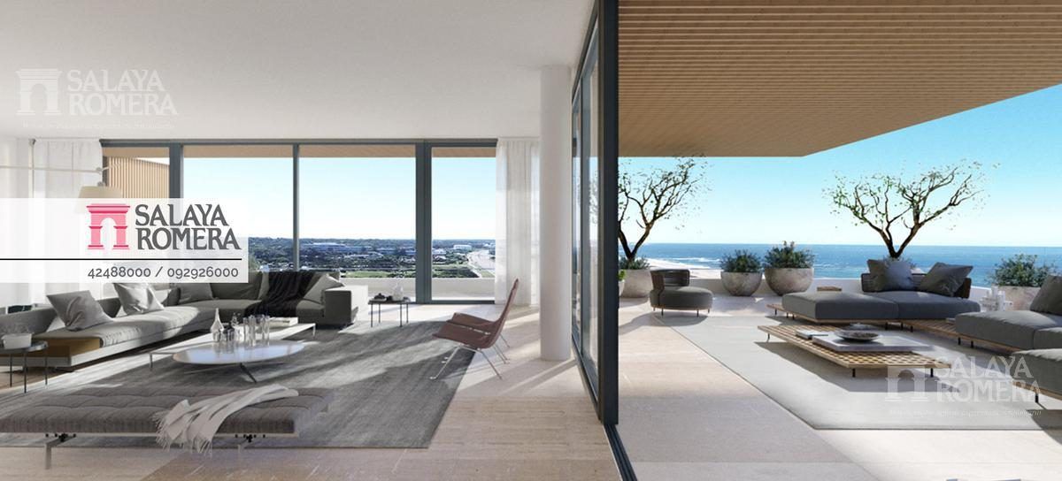 Render del living y la terraza con vista al mar