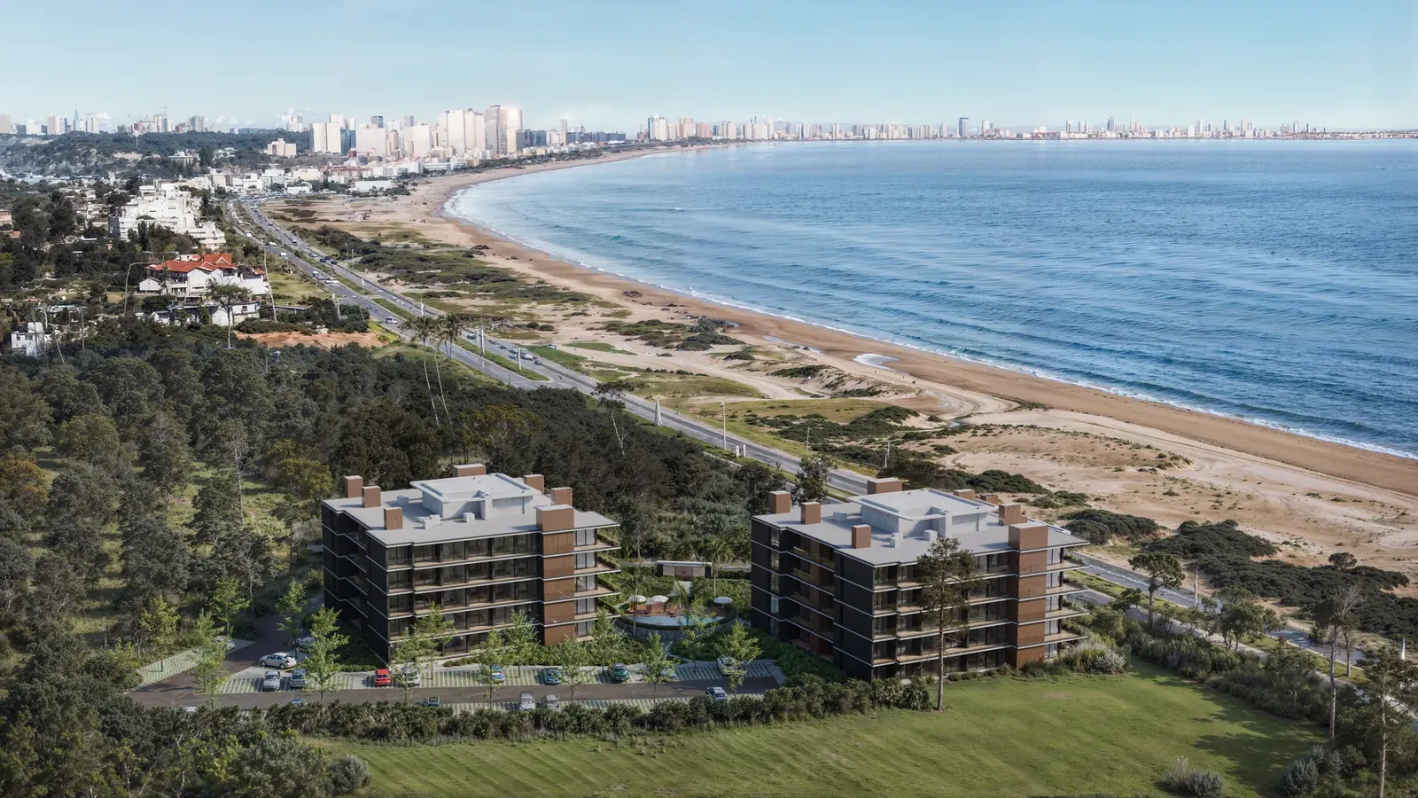 Render aéreo de Mansa Mood 32 pegado a la Playa Mansa, con la bahía y el skyline