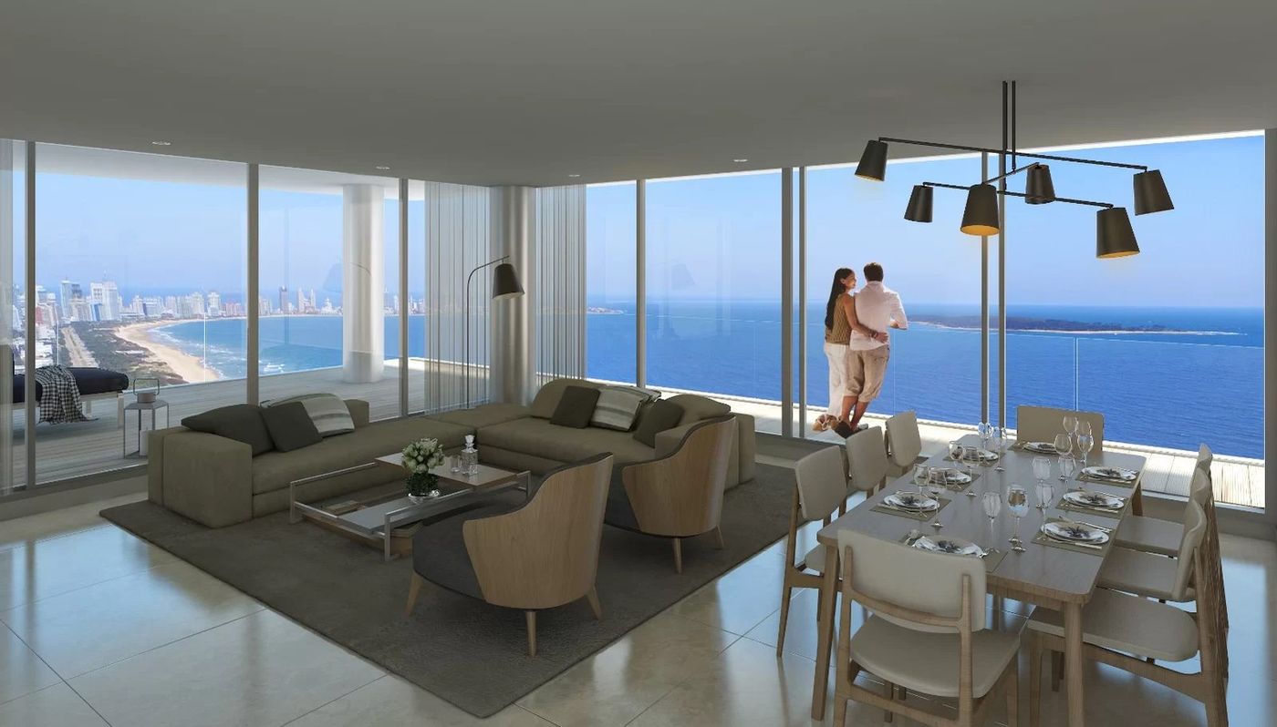Render del living comedor en altura, con la bahía y la península de fondo