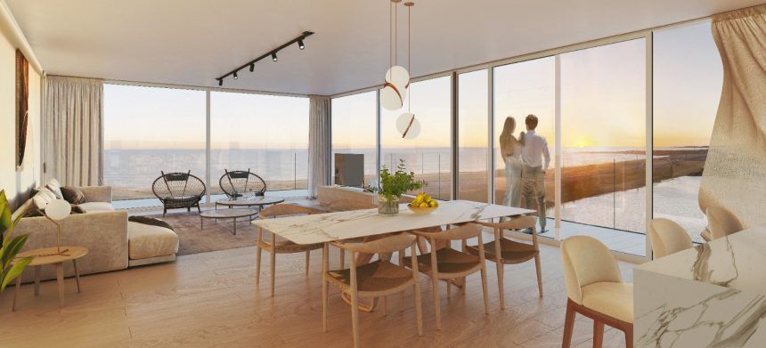 Render del living comedor con esquina vidriada y el atardecer sobre el agua