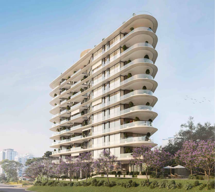 Render completo del edificio, con los jacarandás en flor