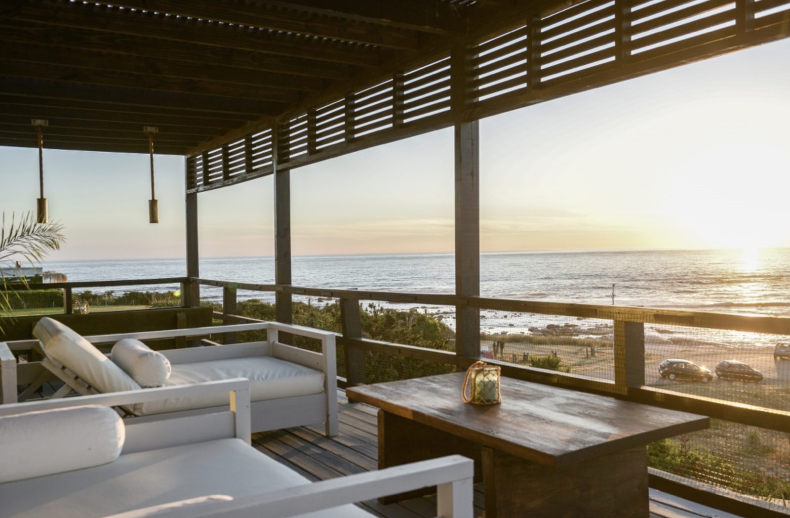 Wooden terrace with sea view at sunset, José Ignacio coast